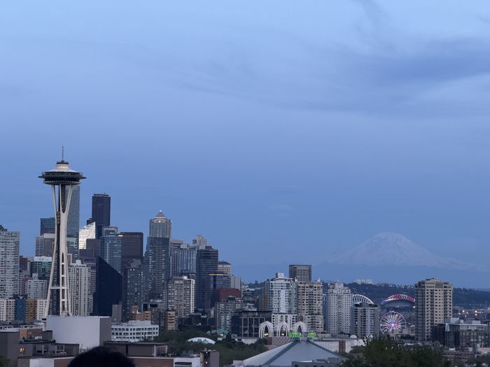 Sitting on an empty freeway with the Seattle skyline behind